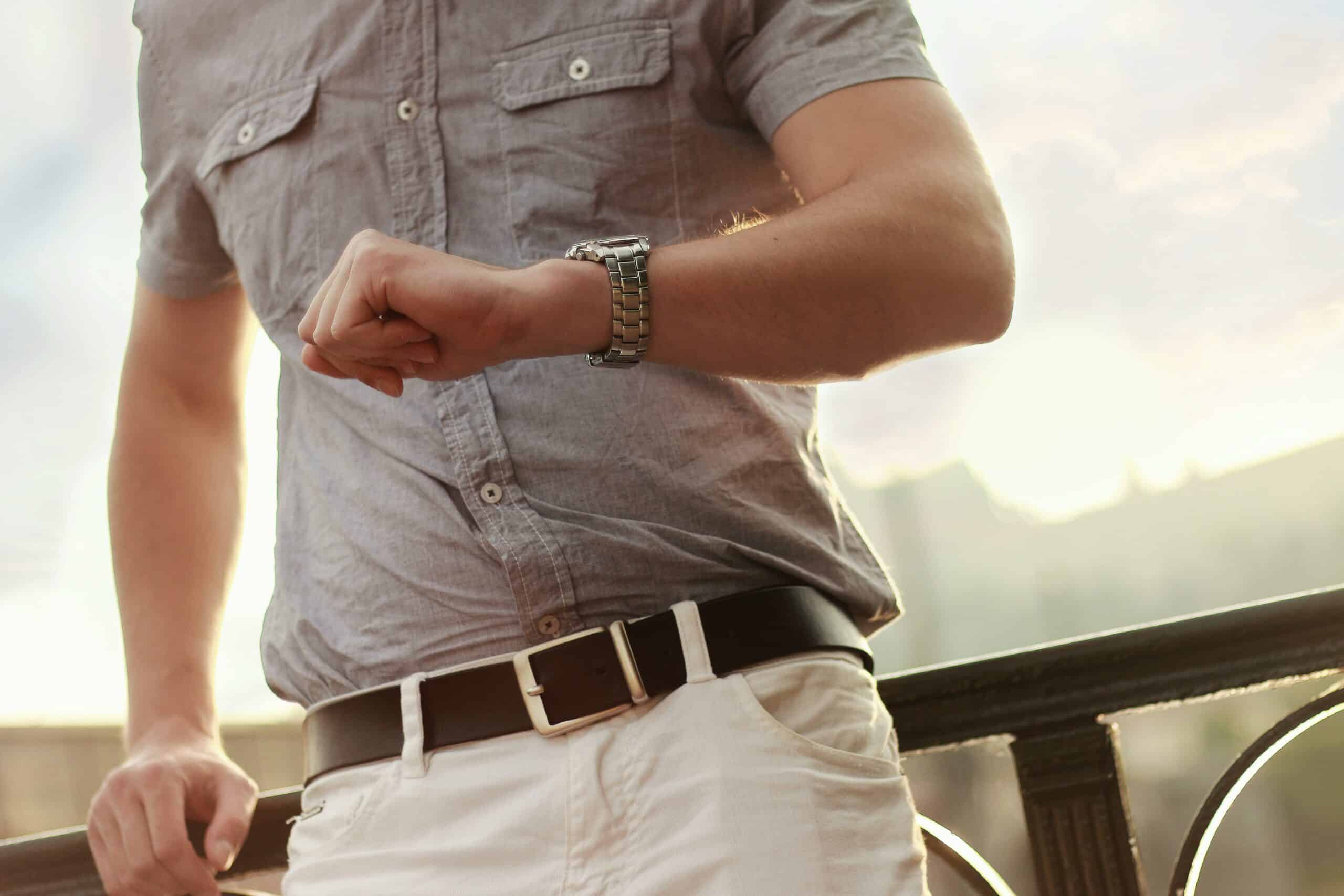Man checks his watch waiting for the outcome of H.R. 7024